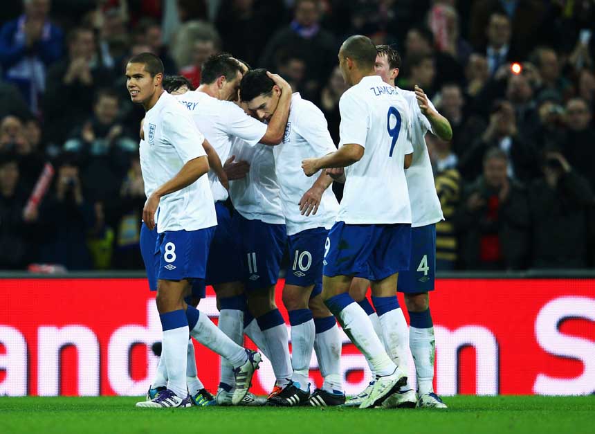 England celebrate the opening goal against Sweden.
